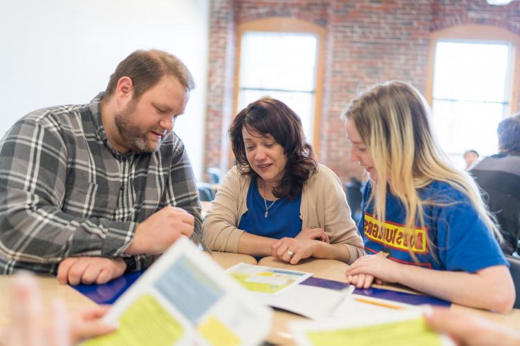 UNH Manchester graduate Ryan Buchanan with other students